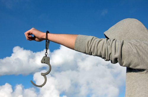 A guy freed from his handcuffs