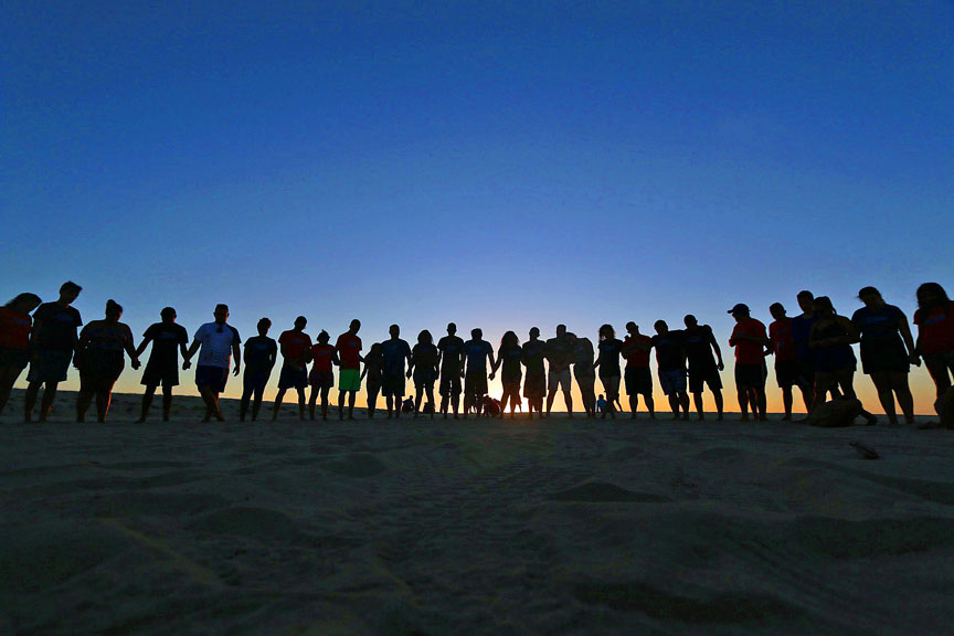People lined up on a horizon
