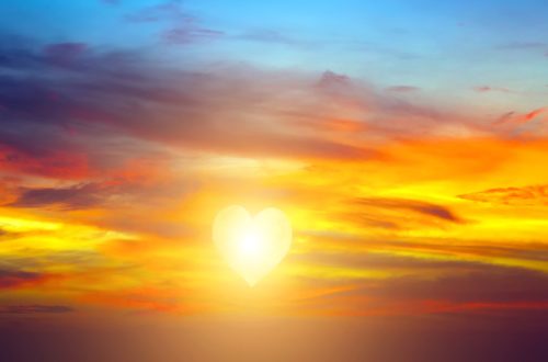 A heart-shaped sun at sunrise