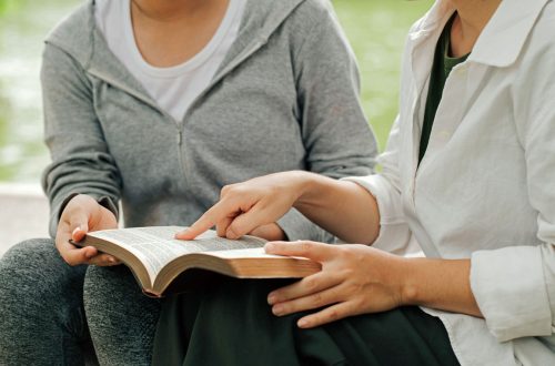 Two women studying and talking about the Bible
