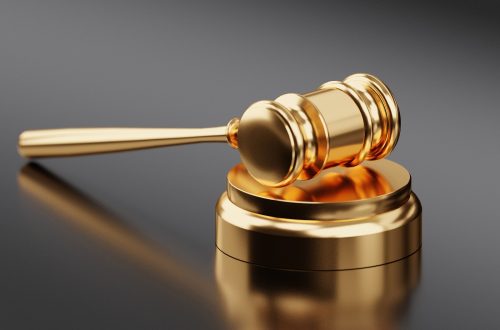 Golden gavel resting on tabletop