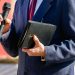 Pastor with a Bible in his hand during a sermon