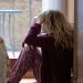 woman at home with depression, loneliness, or sadness