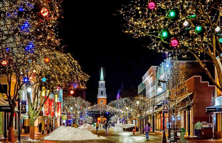 A town decorated for Christmas with lights