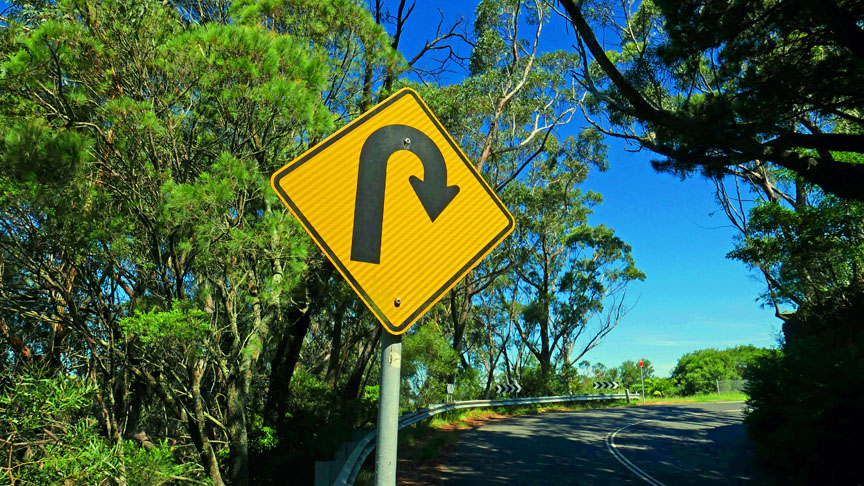 A u-turn road sign
