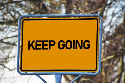 A sign that says, "Keep Going"