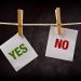 "Yes" and "No" printed on two pieces of paper