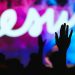 People with lifted hands praising Jesus