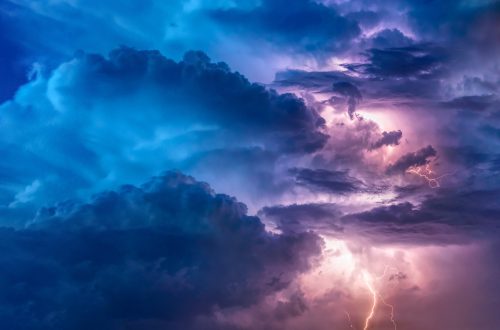 Blue and purple storm clouds with lightning