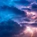 Blue and purple storm clouds with lightning