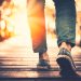 Woman walking over a bridge