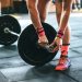 A woman preparing to lift weights