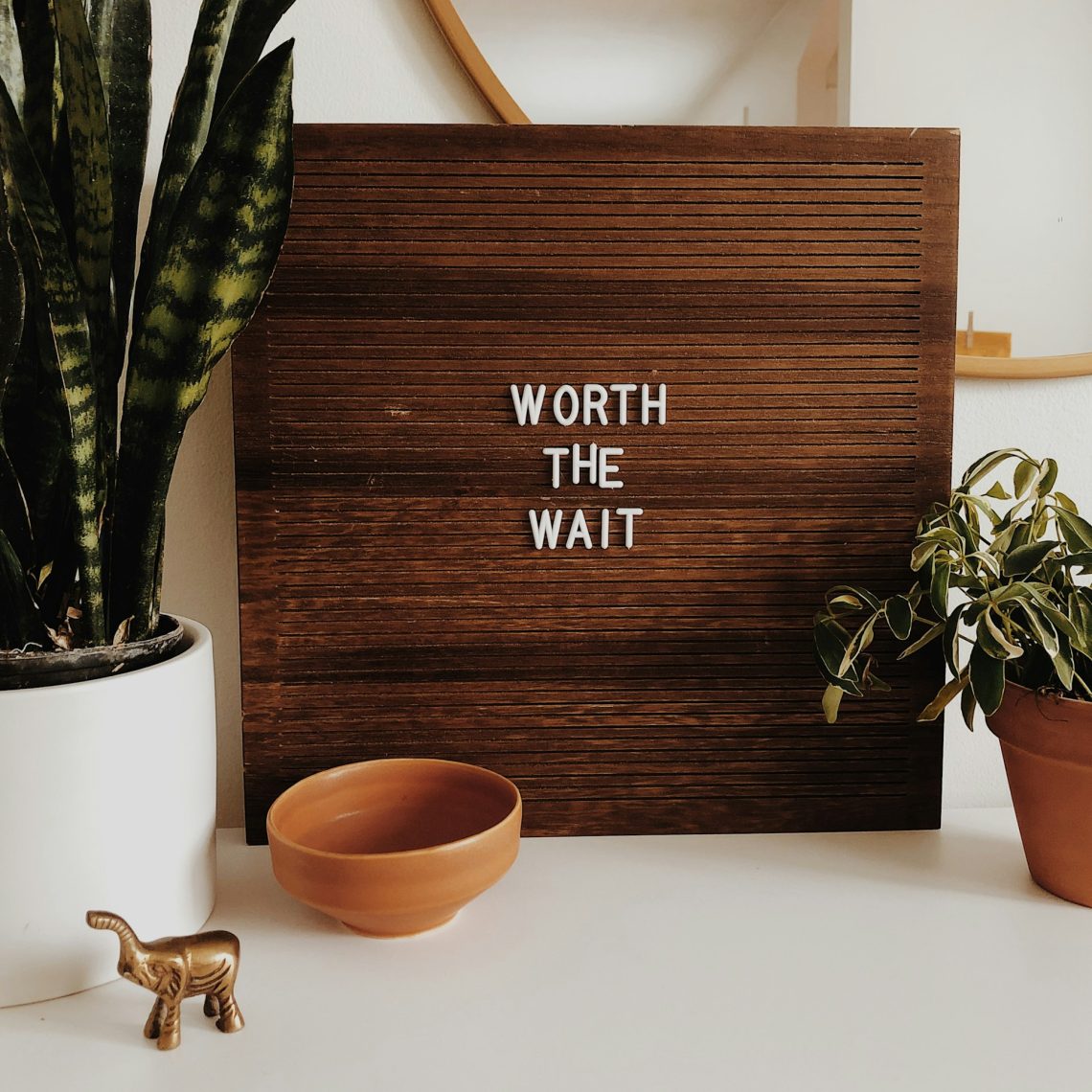 A sign that says "Worth the Wait"