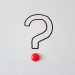 A question mark written on paper