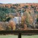 White church in the hills in autumn