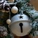 White Christmas bell on Christmas tree