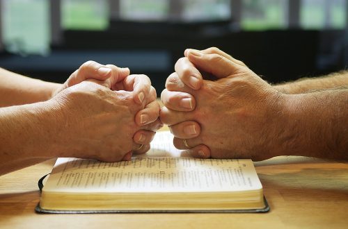 Two people praying